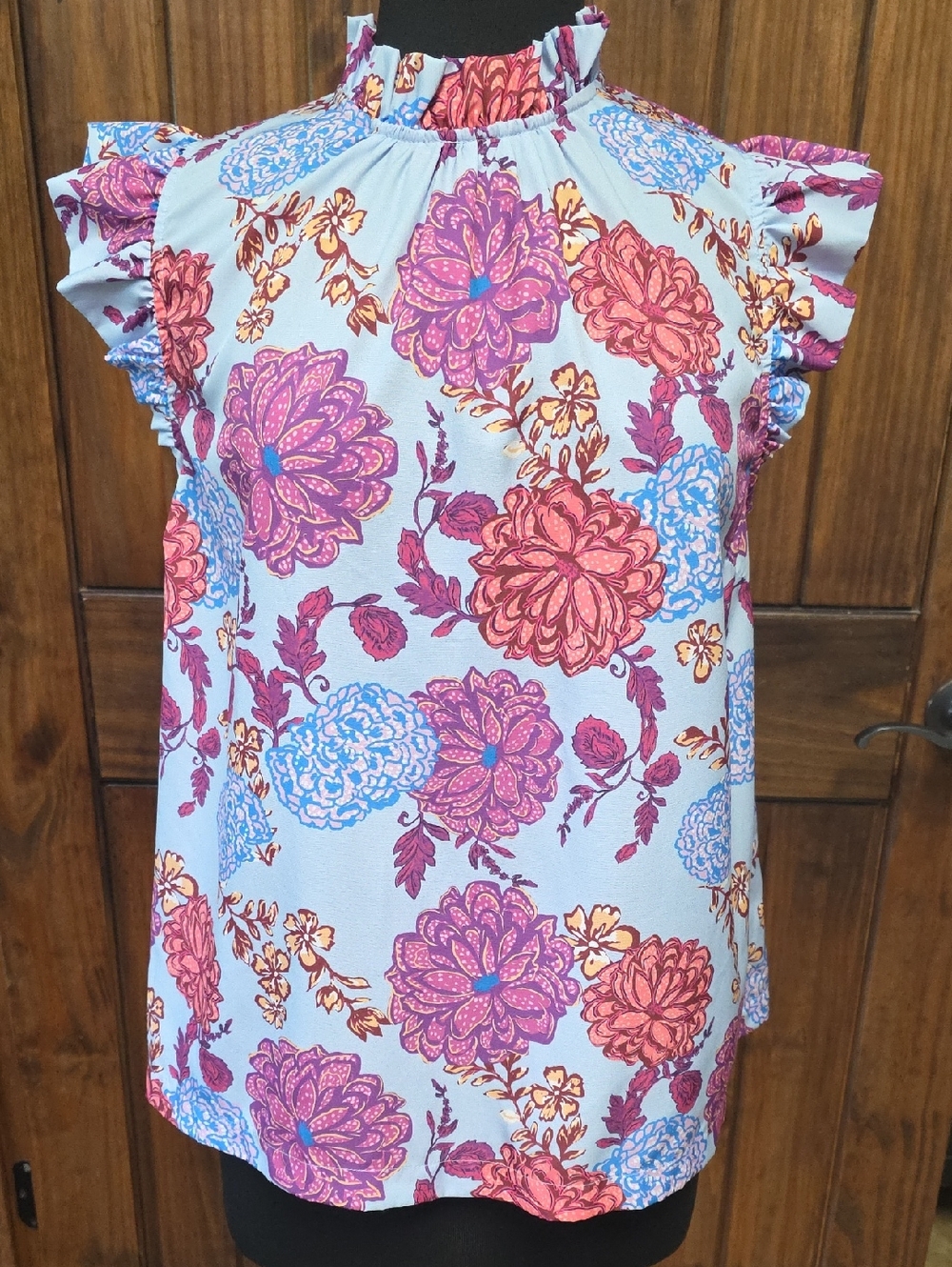 Umgee floral print ruffle neck top with a stand collar and cap sleeves - Size S